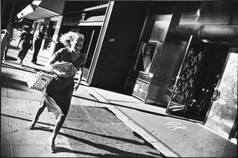 GARRY WINOGRAND (1928-1984) A group of 13 select photographs depicting street scenes in Californa, New York, and Texas.
